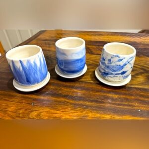 Homemade pottery small flower pots. Perfect for a window sill.